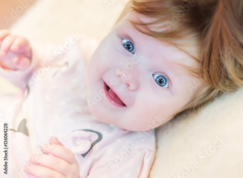 Cute baby girl with blue eyes