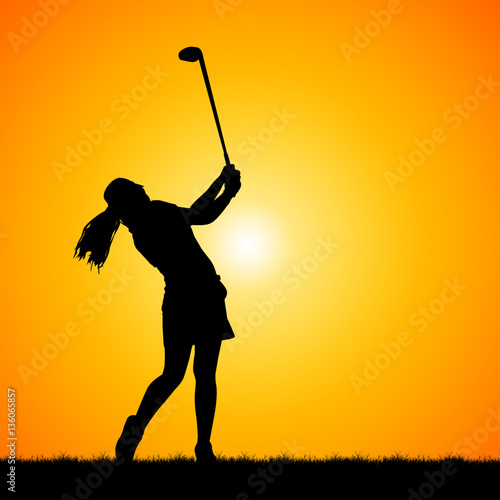 silhouettes golfers against sunset background