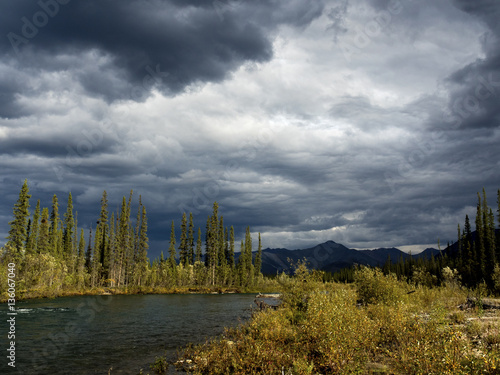 STORM CLOUDS OVER THE RIVER