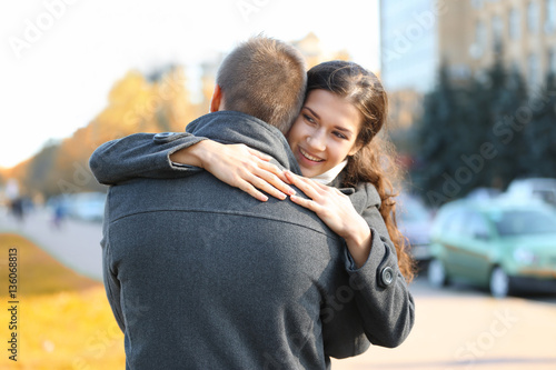 Beautiful young couple outd...