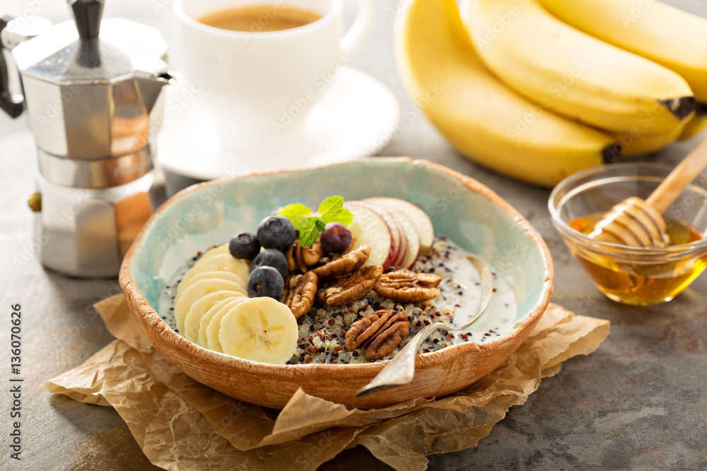 Quinoa porridge with banana, blueberry and pecan nuts