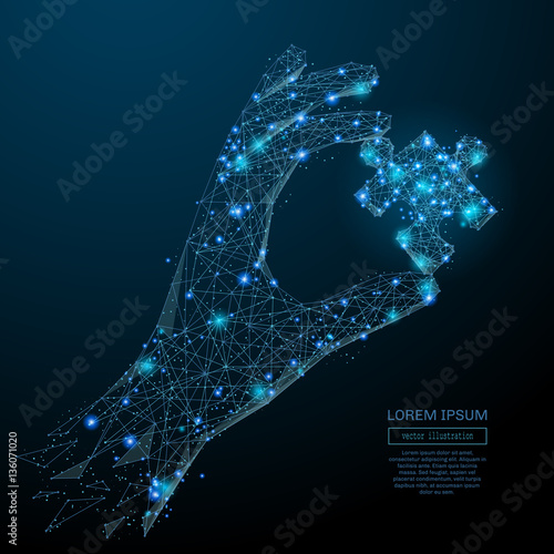 Abstract image of a hand holding puzzle in the form of a starry sky or space, consisting of points, lines, and shapes in the form of planets, stars and the universe. Vector business wireframe concept.