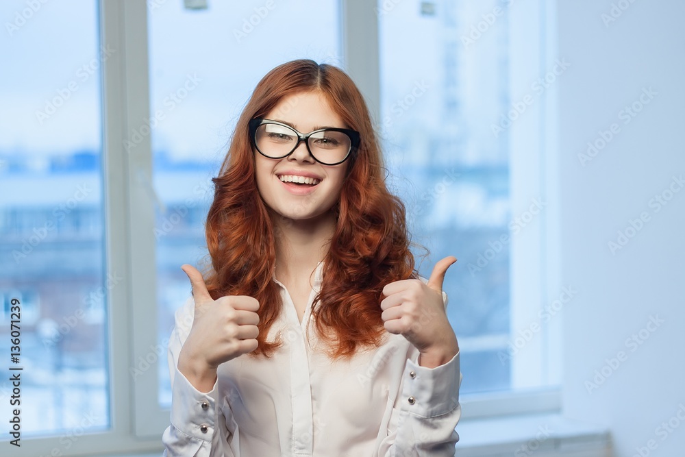 happy woman gesticulating with arms, thumb