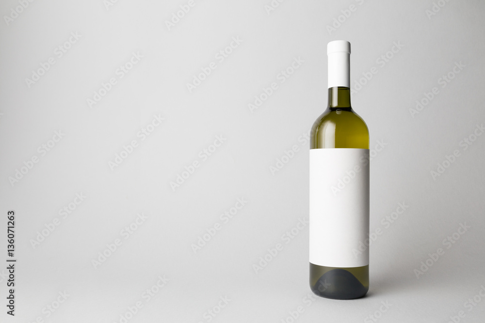 Wine Bottle is standing on gray background Wine Bottle is standing on gray background