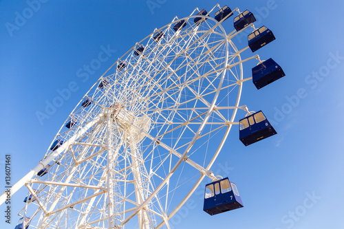 Ferris wheel with blue sky photo