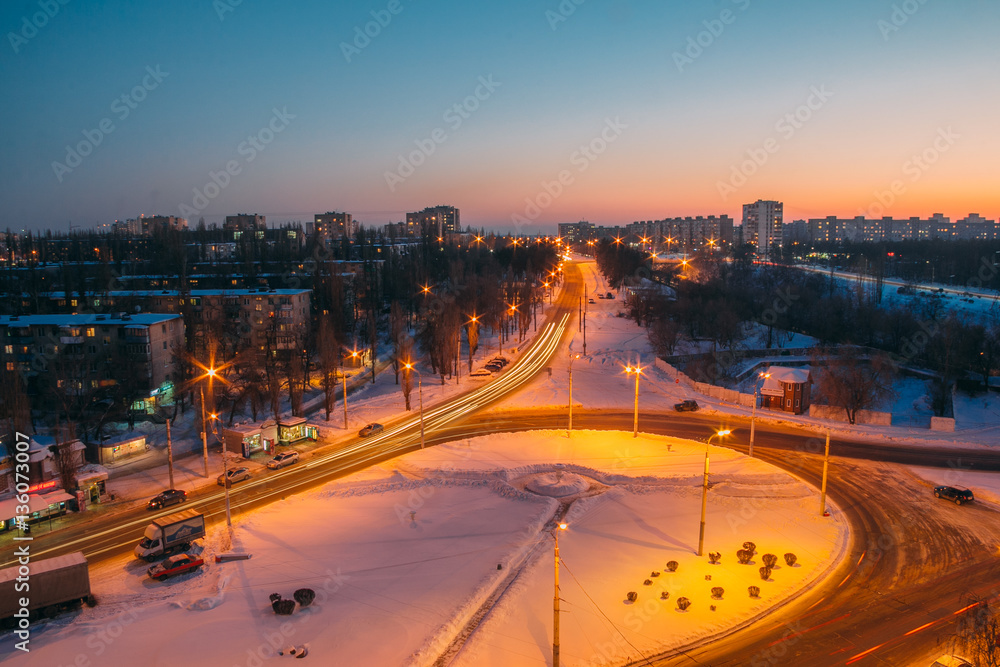 Traffic circle. Night winter cityscape view of Voronezh