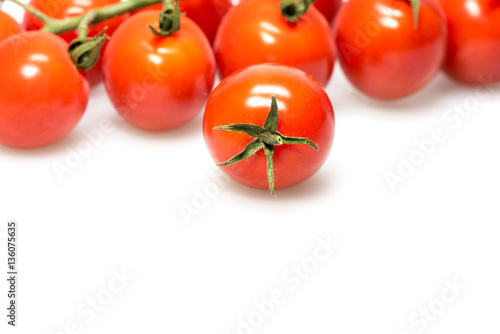 reshly picked cherry tomatoes on a branch
