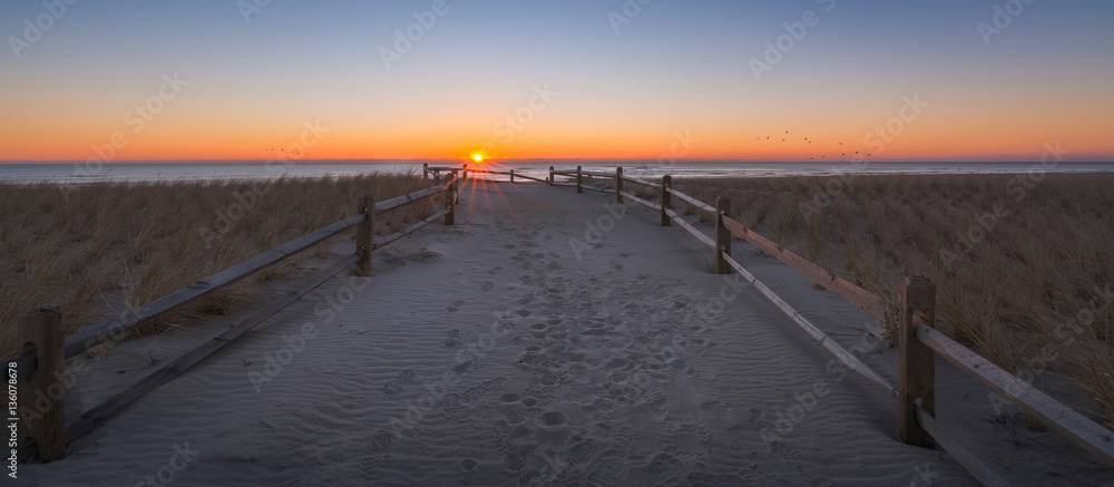 Pathway to the beach during a sunrise in New Jersey 