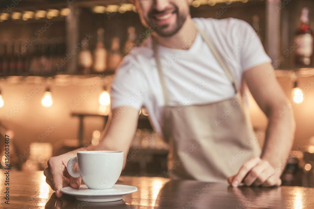 Handsome barista working Handsome barista working