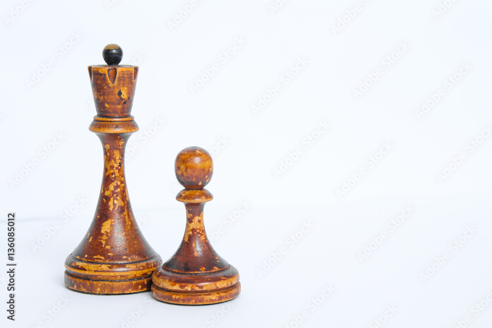 Old chess Board with wooden pieces on a white background. Old chess Board with wooden pieces on a white background.