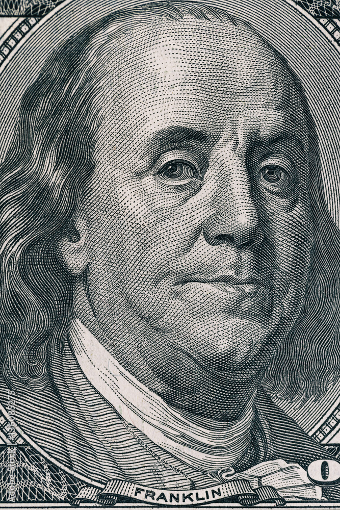 Vertical portrait of Benjamin Franklin's face on the US 100 dollar bill ...