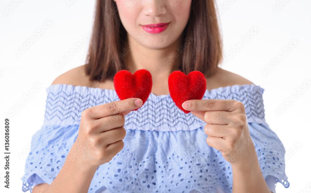 Closeup of woman hand hold red heart Closeup of woman hand hold red heart