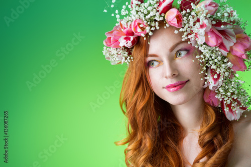 young woman in a wreath of tulips © Evgenia Tiplyashina