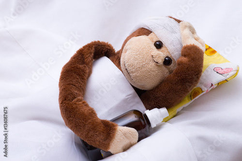 a toy monkey is sick