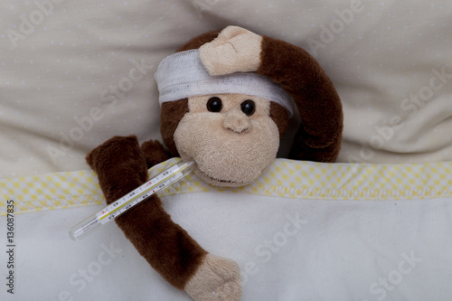 a toy monkey is sick