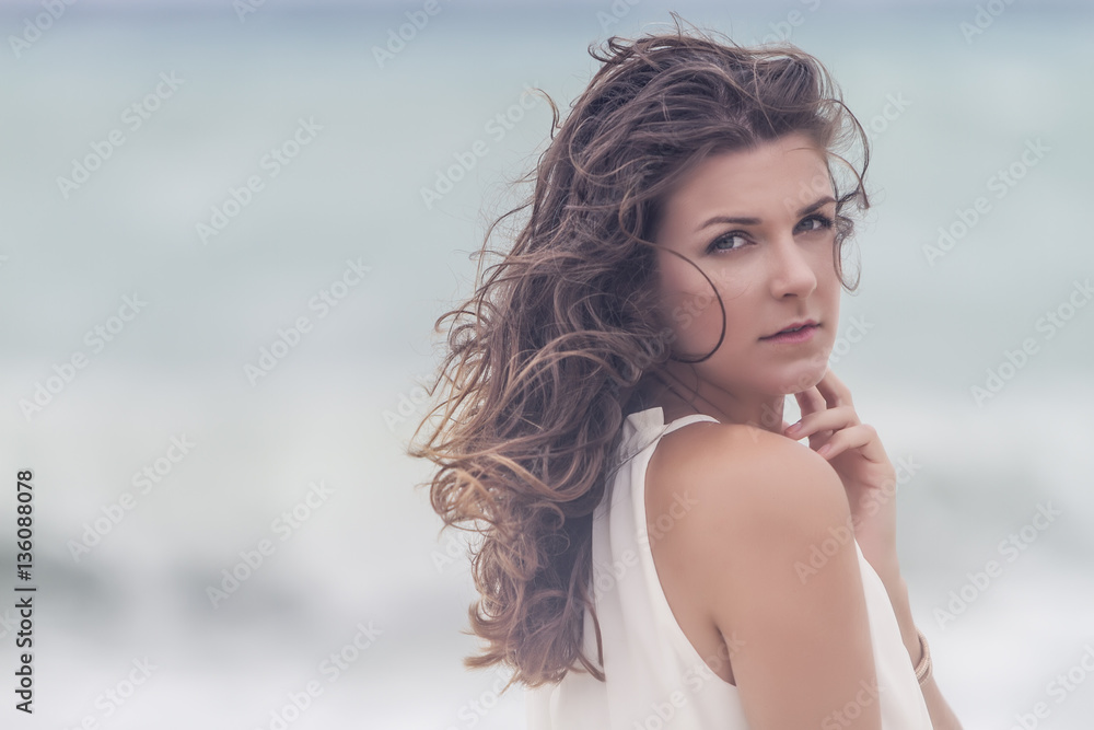 Portrait of a young attractive and beautiful woman in front of t Portrait of a young attractive and beautiful woman in front of t
