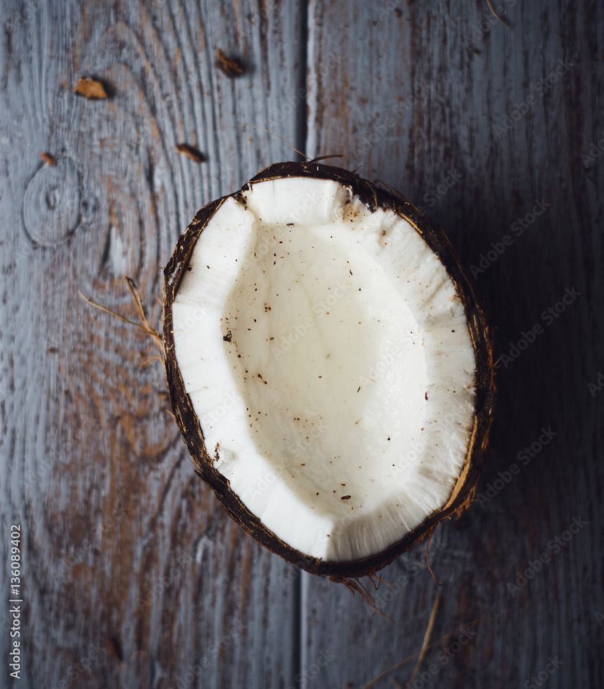 Fresh healthy coconut on wooden table top view Fresh healthy coconut on wooden table top view