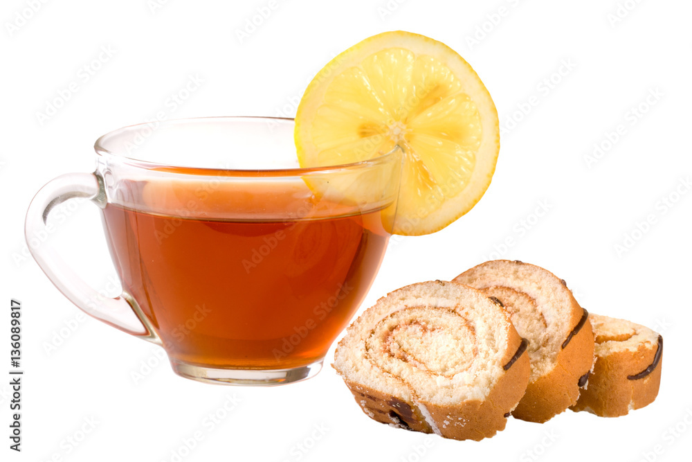slices of biscuit roll with a cup of tea isolated on white background closeup slices of biscuit roll with a cup of tea isolated on white background closeup