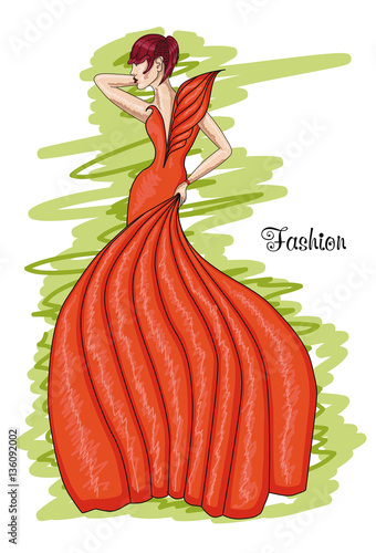 Woman in a long orange dress. Flame-colored dress .  Fashion and hairstyle.
