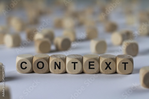 context - cube with letters, sign with wooden cubes photo