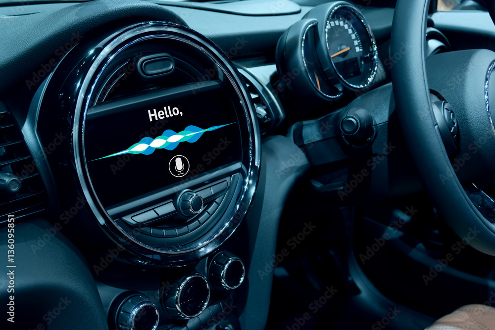 Voice recognition , speech talk and internet of things (iots) in smart car concept. Car 's console show application display and sound wave.