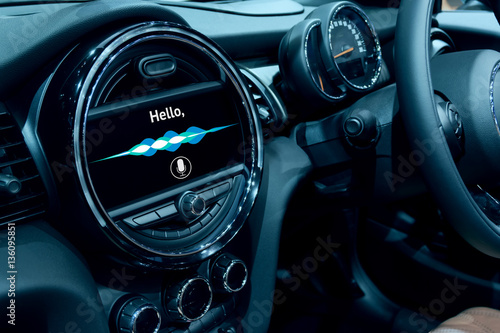 Voice recognition , speech talk and internet of things (iots) in smart car concept. Car 's console show application display and sound wave. © zapp2photo