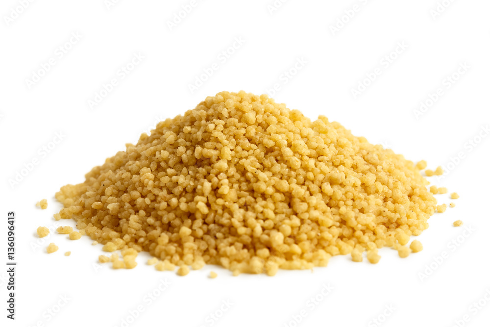 Heap of dry couscous isolated on white. Heap of dry couscous isolated on white.