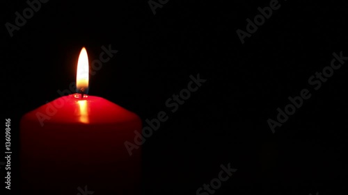 Red candle lit and extinguished. Romantic evening on Valentine.