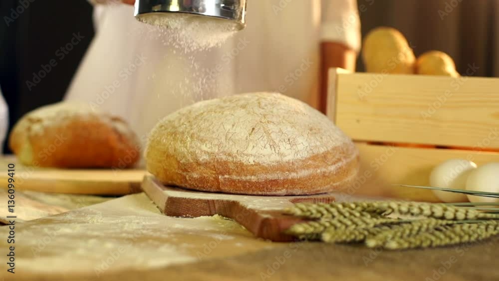Pour the flour to bread in slow motion Pour the flour to bread in slow motion