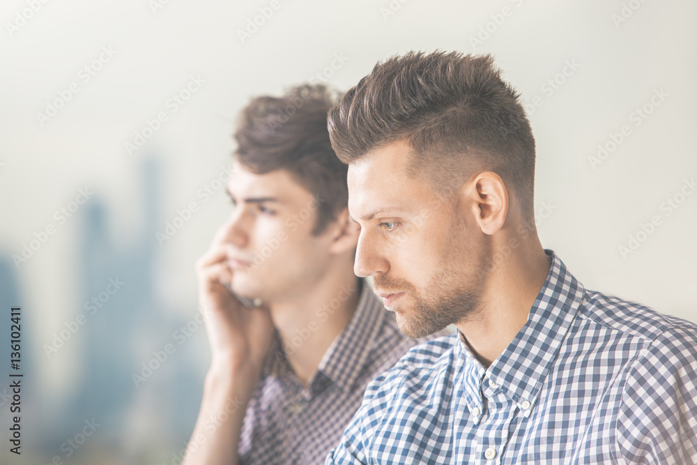 Portrait of two attractive men