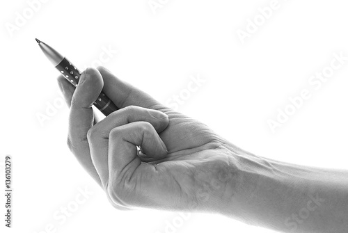 Pen in hand on an isolated background