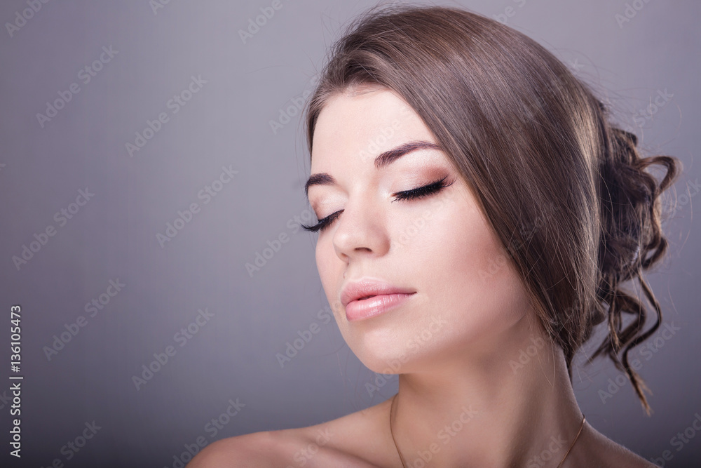 young beautiful girl with a wedding makeup young beautiful girl with a wedding makeup