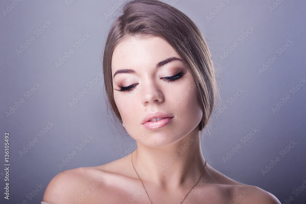 young beautiful girl with a wedding makeup young beautiful girl with a wedding makeup