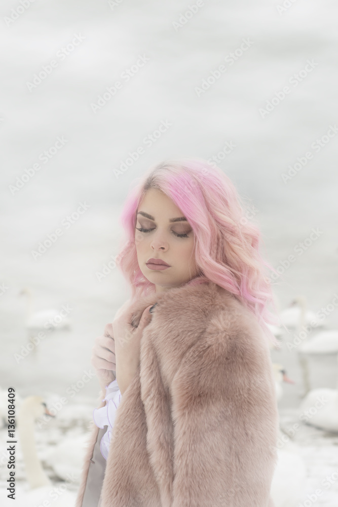 Beautiful girl with pink hair. Morning's fog. Swans on the river. Beautiful girl with pink hair. Morning's fog. Swans on the river.