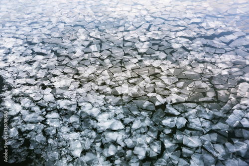 Spring ice drifting on the river
