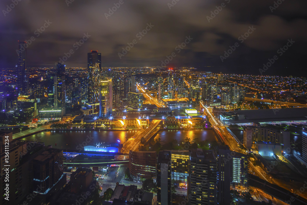An aerial view of Melbourne cityscape at night