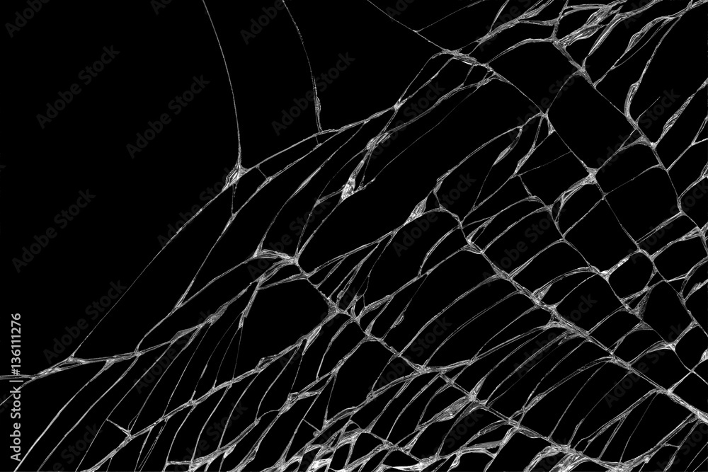 Abstract of cracks of the glass on a black background.