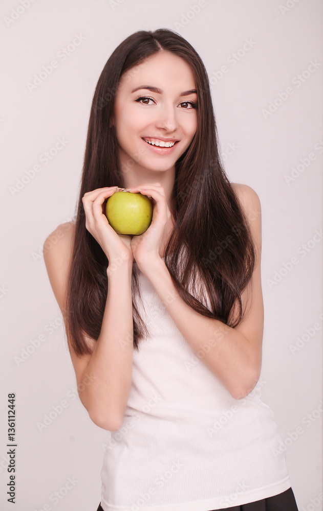Diet. The young beautiful girl who cares for her figure, making healthy food choices, fresh fruit. The concept of healthy eating Diet. The young beautiful girl who cares for her figure, making healthy food choices, fresh fruit. The concept of healthy eating