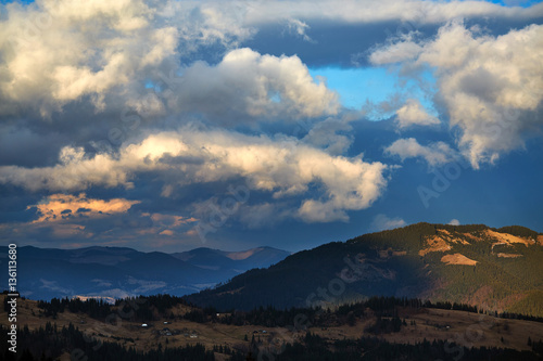 Beautiful view of the blue winter mountains and hills in Carpathians on the sunrise © vitaliymateha