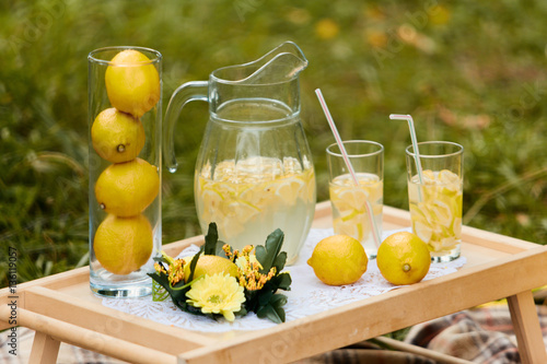 Lemonade pitcher with lemon