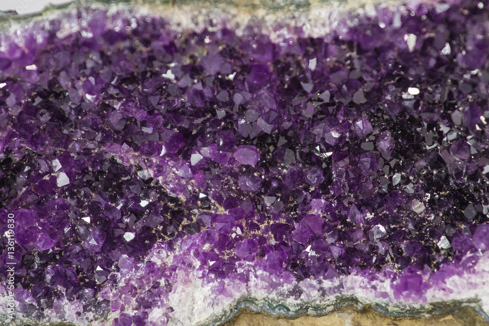 Purple amethyst geode cathedral isolated over white background Purple amethyst geode cathedral isolated over white background