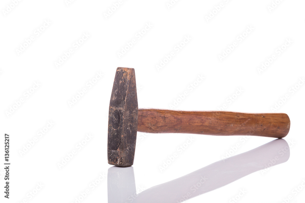 Old steel hammer with wood handle. Studio shot isolated on white Old steel hammer with wood handle. Studio shot isolated on white