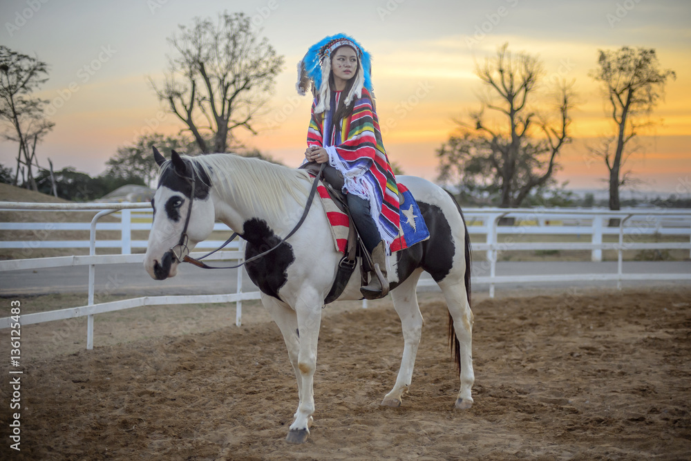 Asian cute girl riding horse at the sunset. Asian cute girl riding horse at the sunset.