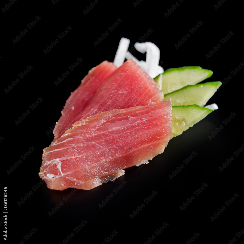 traditional fresh japanese sushi rolls on a black background traditional fresh japanese sushi rolls on a black background