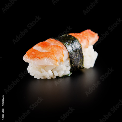 traditional fresh japanese sushi on a black background