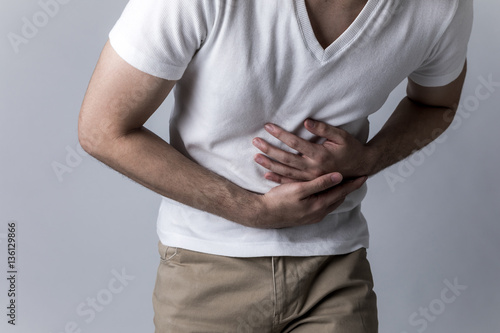 young man having a stomachache