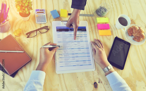 Wallpaper Mural Business woman investment consultant analyzing company seal report balance sheet statement working with documents. Concept picture of economy, market, office,money and tax. Torontodigital.ca