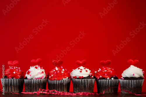cupcakes set many for valentines on red close up hearts