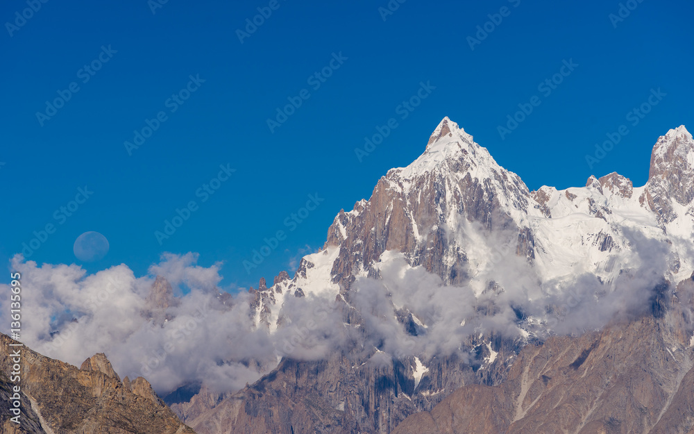 Naklejka premium Paiju peak with big moon at Goro II camp, K2 trek, Pakistan