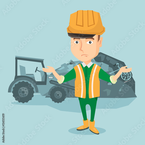 Worker and bulldozer at rubbish dump.